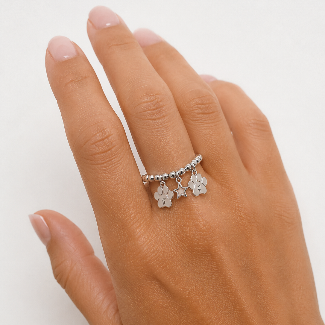 Anello con sfere,zampa e stella in argento 925 